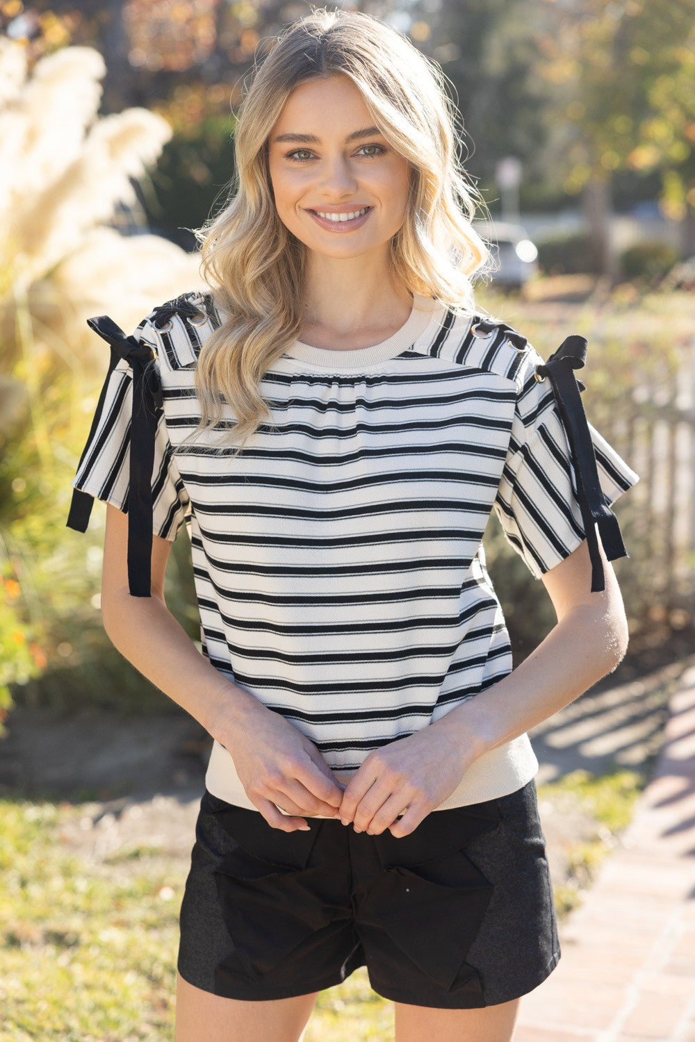 Downtown walks Lace Up Grommet Detail Striped Knit Top